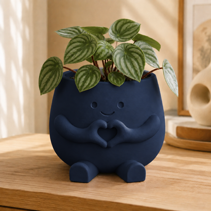 Vaso amiguinho com carinha sorridente e mãos fazendo coração, na cor azul-escura