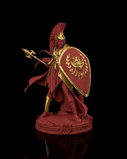 Estátua da deusa Atena em postura de batalha com lança e escudo, na cor vermelha, com detalhes dourados