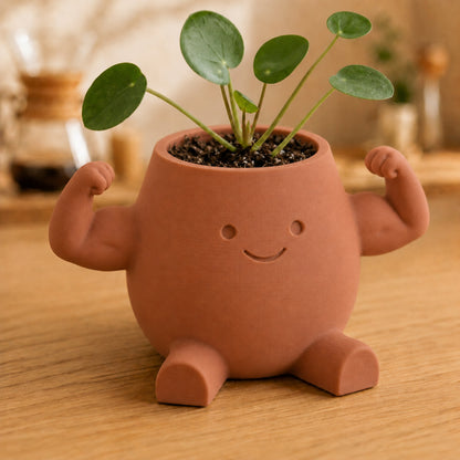 Vaso amiguinho flexionando o braço para mostrar o bíceps, na cor marrom terracota
