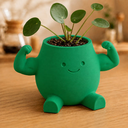 Vaso amiguinho flexionando o braço para mostrar o bíceps, na cor verde
