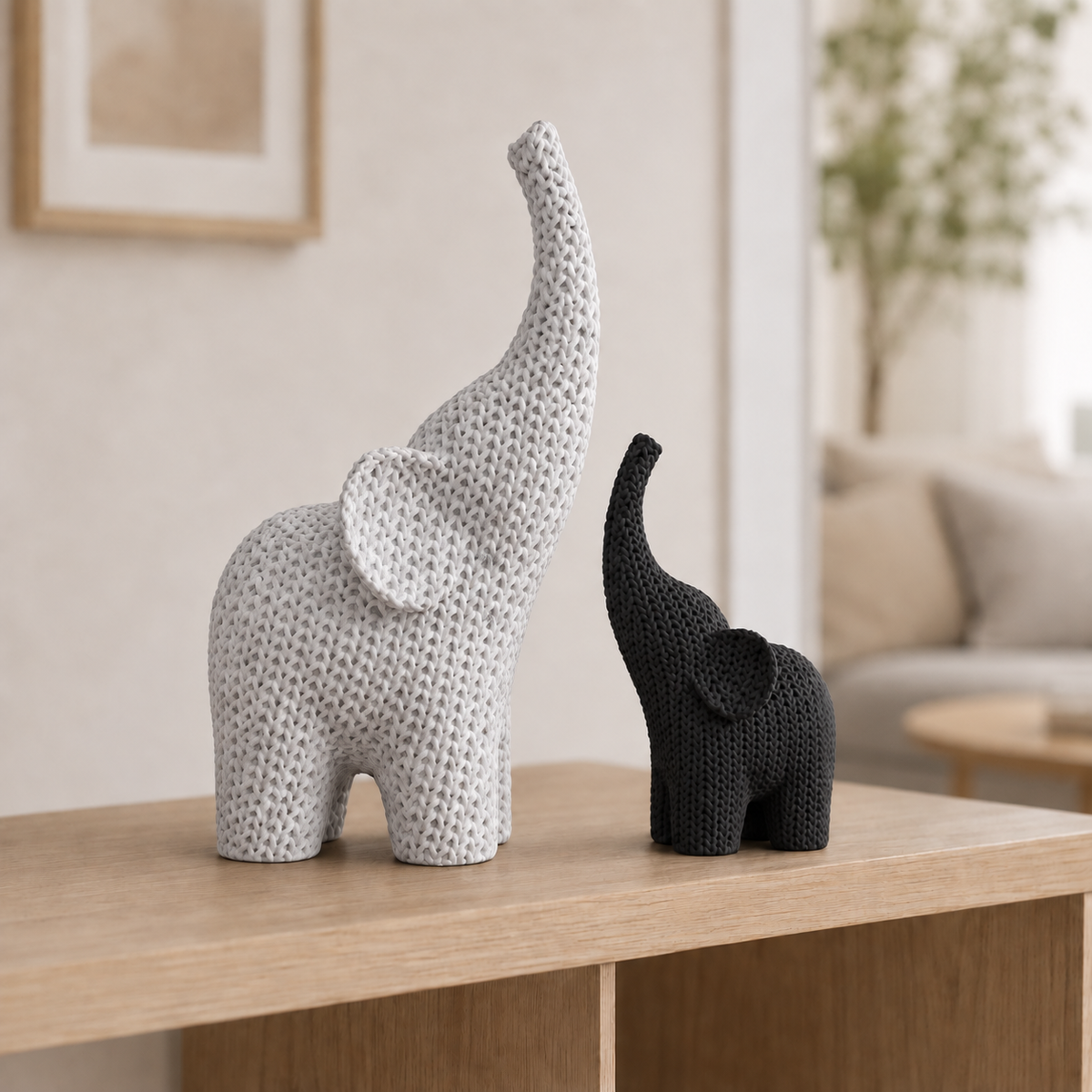 Lanoso — elefante maior em Mármore e menor em Preto.