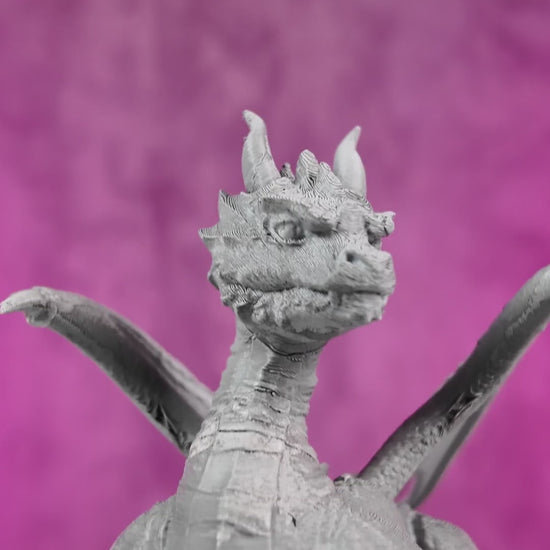 Vídeo da fonte Resting Guardian em funcionamento, com jatos de água ao redor do dragão