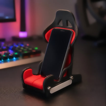 Suporte de celular banco de corrida preto e vermelho no setup gamer
