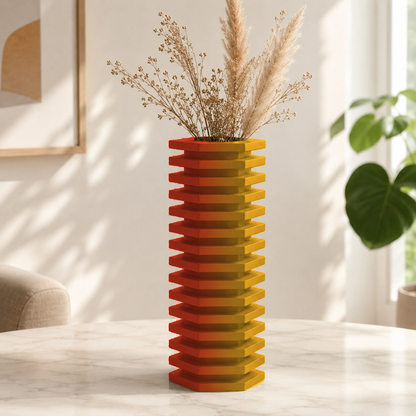 Vaso decorativo com camadas escalonadas em zigurate, na cor vermelha e dourada